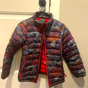 Patagonia slightly used kids jacket . Size says L-12 will fit 8-12 years old